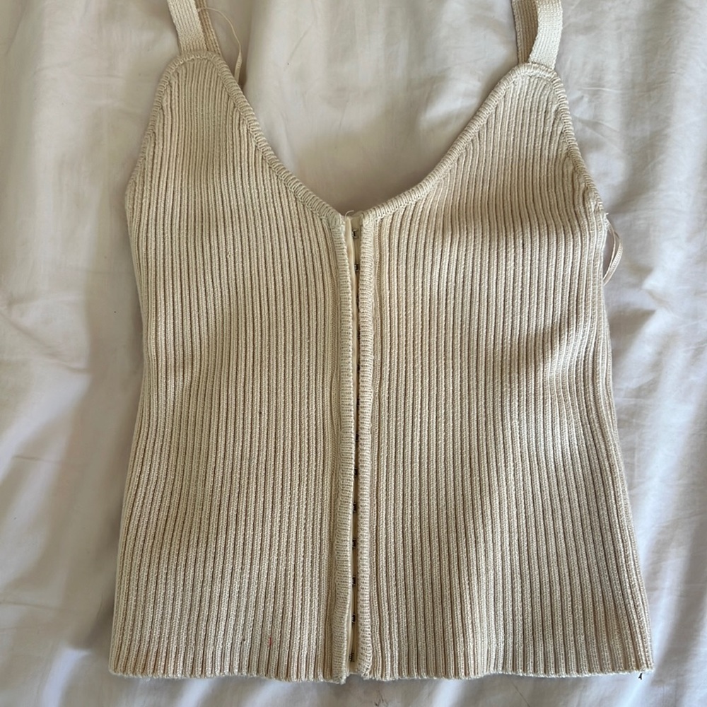 This is a Zara cream knit corset top in a size medium.